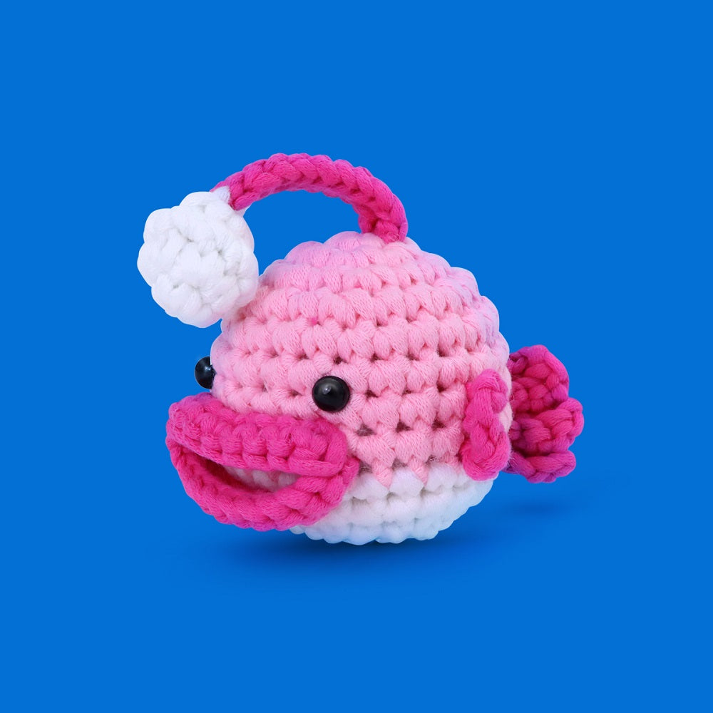 NestledCrafts Crochet Kit for Beginners, Amigurumi Animal Kit, with Step-by-Step Video Tutorials - Anglerpuff